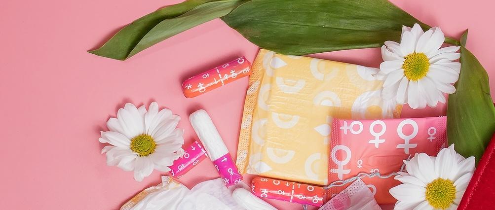 Menstrual tampons and pads in cosmetic bag.
