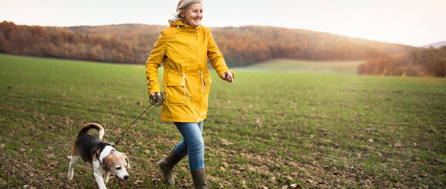 woman running with dog